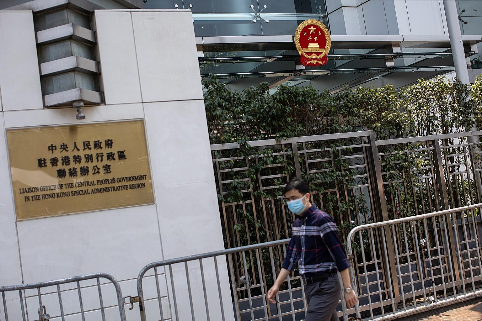 Beijing's liaison office in Hong Kong. News of the expected Cabinet shake-up came after the Hong Kong government issued several contradictory press releases over the weekend on mainland China's liaison office.
