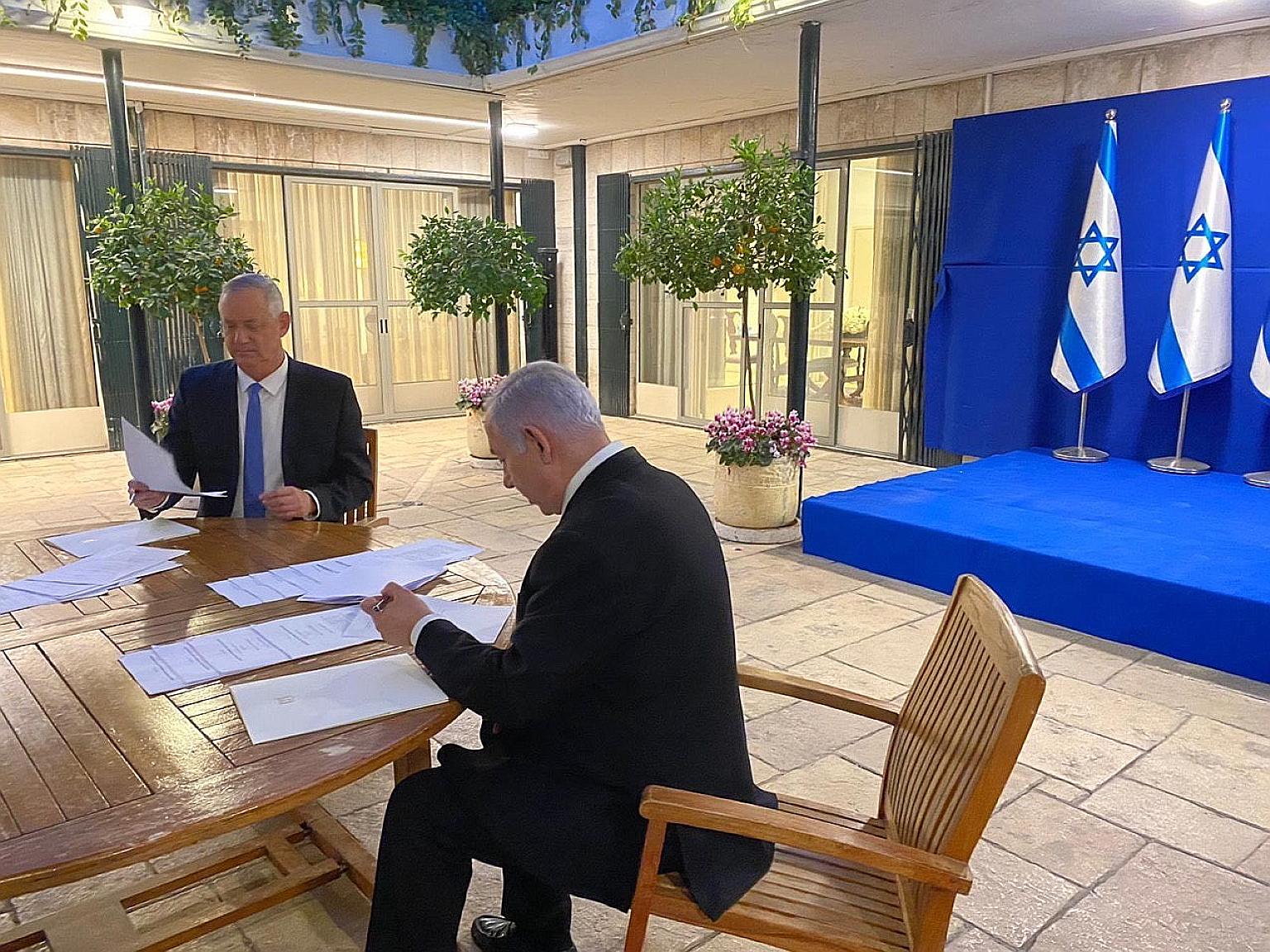 Israeli Prime Minister Benjamin Netanyahu (right) and Mr Benny Gantz at their meeting in Jerusalem on Monday.