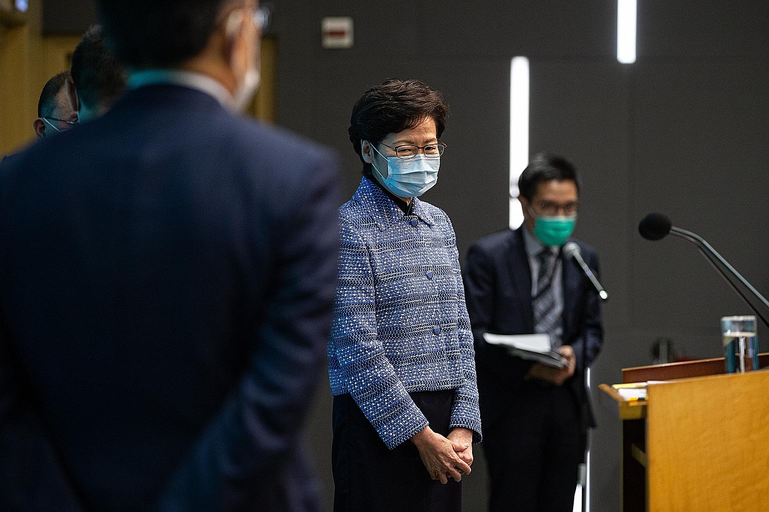 Hong Kong Chief Executive Carrie Lam said at a press conference to announce her Cabinet reshuffle yesterday that the administration had to start planning for the city's economic recovery from the pandemic. PHOTO: EPA-EFE