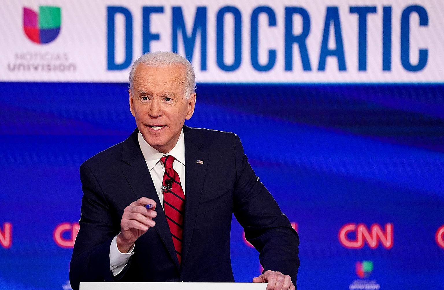 Mr Joe Biden during a Democratic debate in March, held in CNN's Washington studios without an audience because of the coronavirus pandemic. PHOTO: REUTERS
