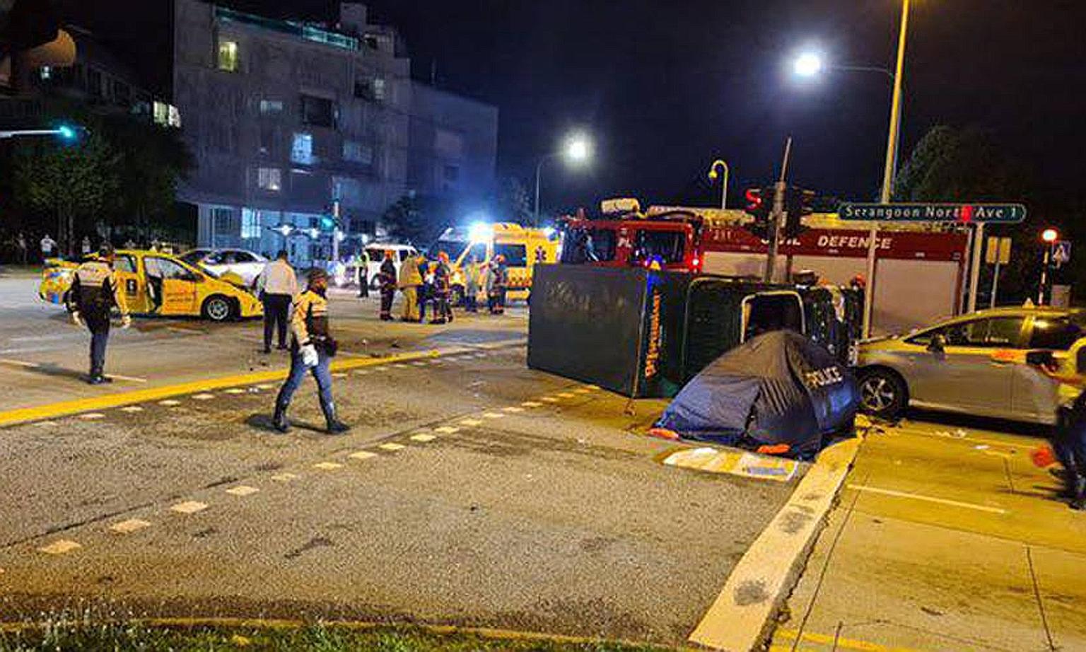 The accident involving a lorry, a taxi and a car occurred at the junction of Phillips Avenue, Yio Chu Kang Road and Serangoon North Avenue 1. An eyewitness said he saw Singapore Civil Defence Force officers trying to lift the overturned lorry.