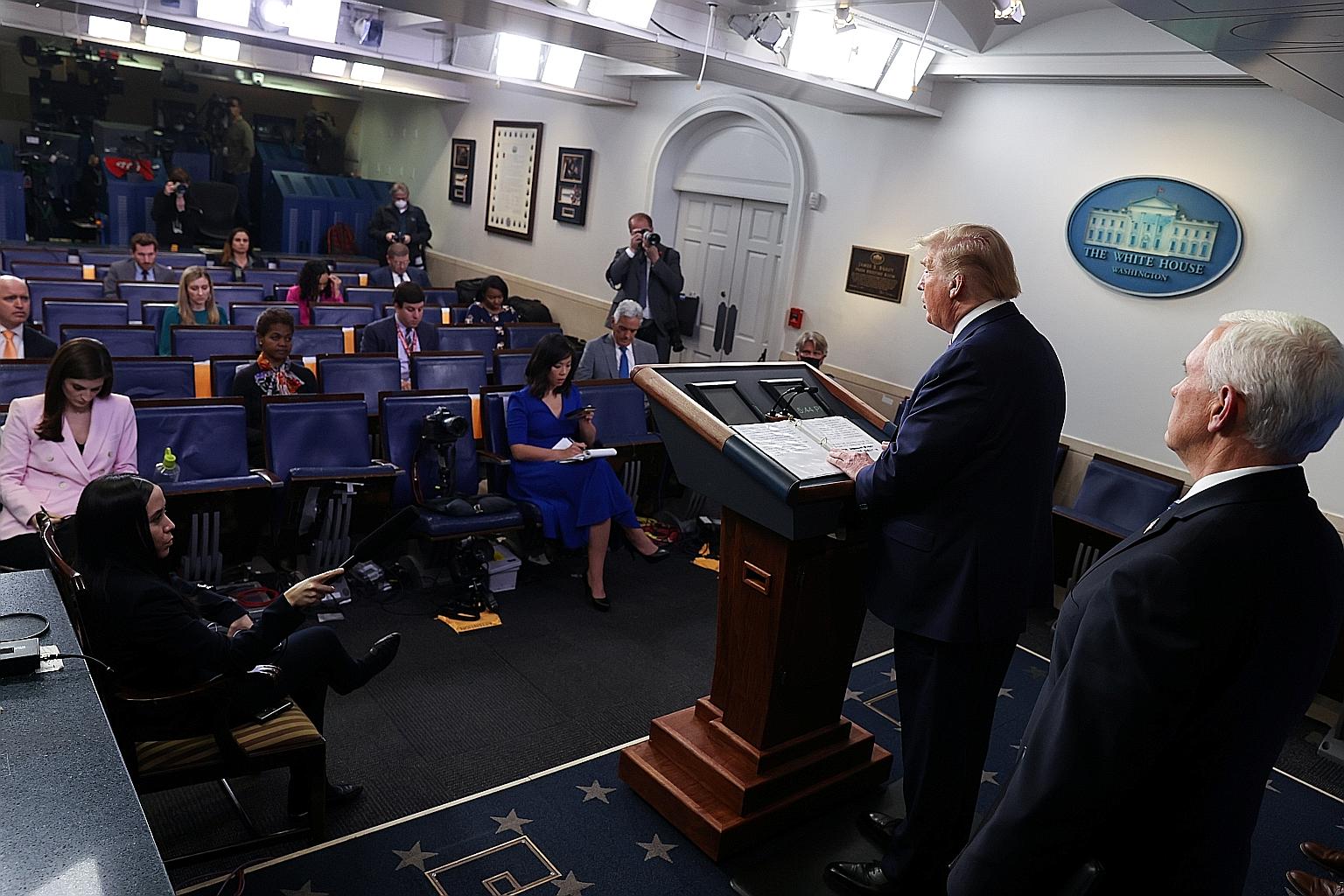 President Donald Trump at the daily coronavirus outbreak task force briefing on Friday, accompanied by Vice-President Mike Pence (right). Mr Trump has since said he had posed his theory on cleaning the body with disinfectant "in the form of a sarcast