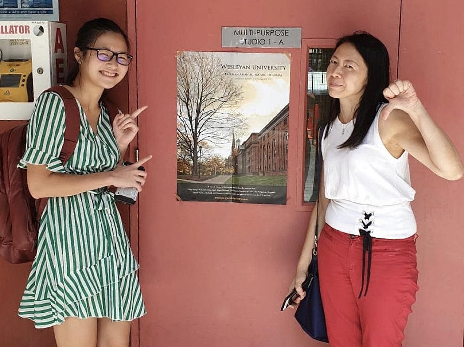Singaporean Andrea Ho, who has recently been accepted into Georgetown University, with her mother Shirley Tey, who is cautious about the teen going overseas before the pandemic is brought under control. 