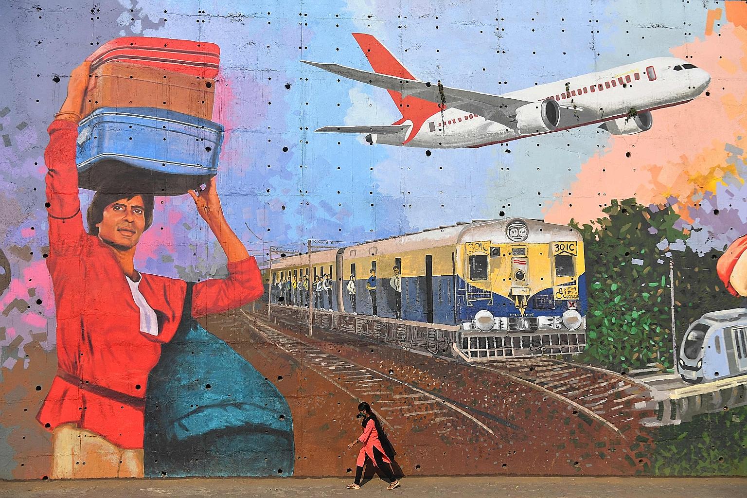 A mural in Mumbai depicting Bollywood actor Amitabh Bachchan in the 1983 movie Coolie. The coronavirus pandemic has brought India's prolific Hindi film industry to a standstill. It has been shut since March 19, following a unanimous decision from sev