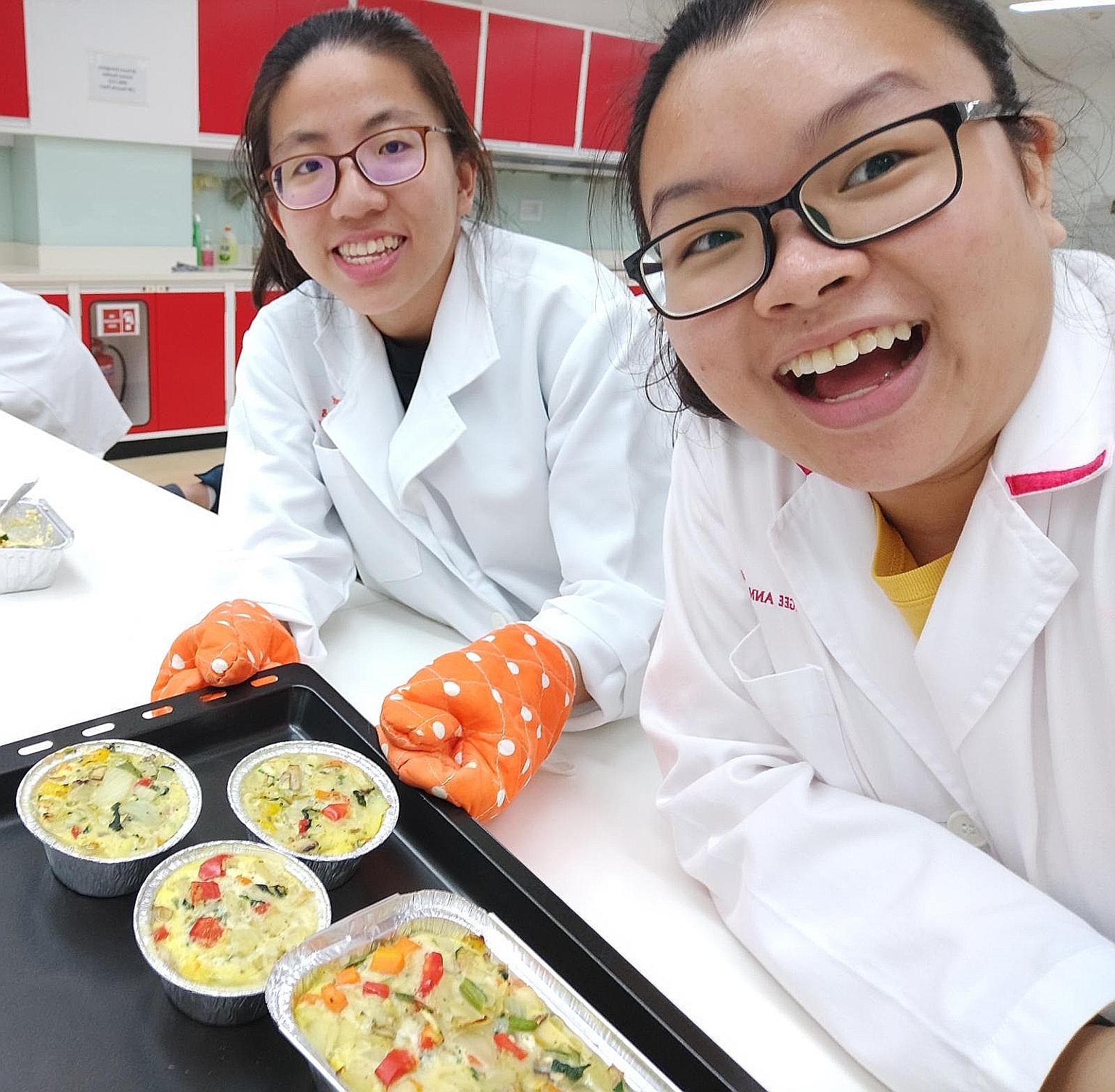Ms Vernice Vee (at right), who took pharmacy science at Ngee Ann Polytechnic, has applied to go to the National University of Singapore. She is seen here with course mate Natasha Teo. PHOTO: VERNICE VEE