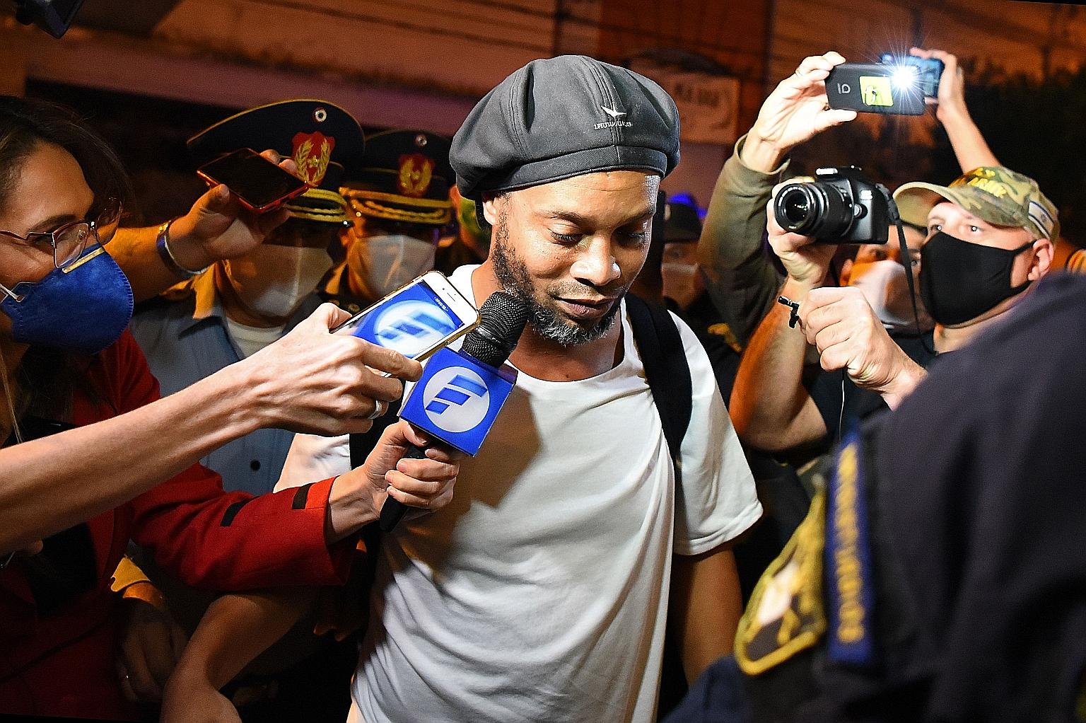 Retired Brazil football star Ronaldinho arriving at the Palmaroga Hotel in Asuncion, where he and his brother are under house arrest for using false Paraguayan passports to enter the country. He praised fellow inmates and officials for making his sta