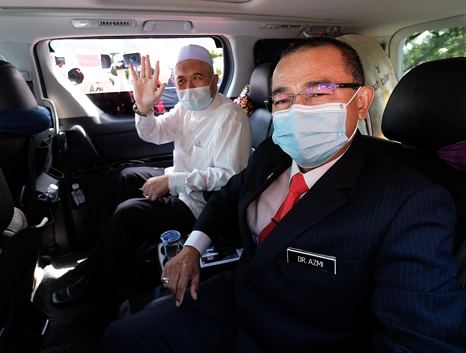 Malaysian Deputy Health Minister Noor Azmi Ghazali (right) and Perak state Cabinet member Razman Zakaria had visited an infected area for social purposes on April 18, an activity banned by the movement control order.