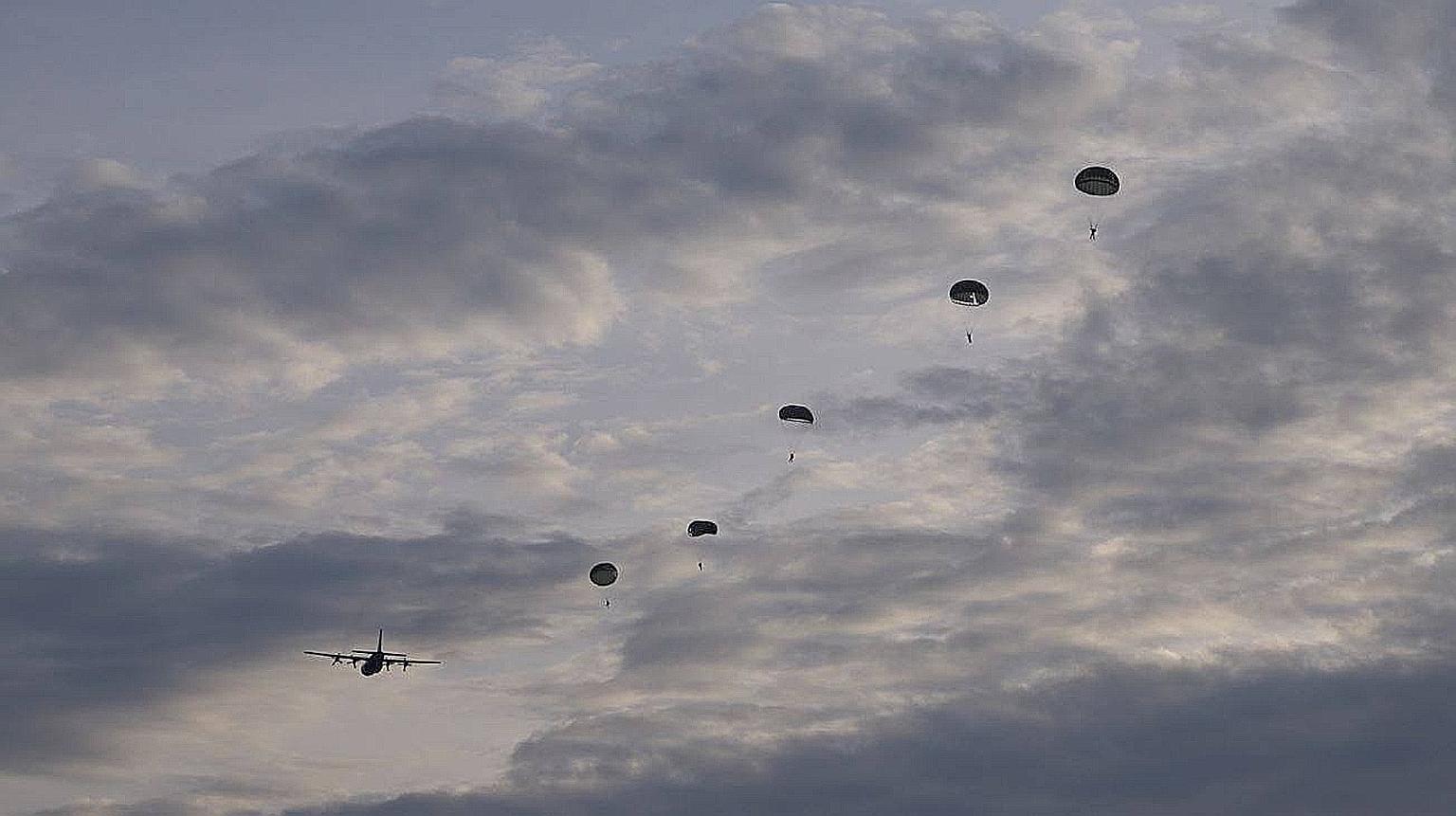 Trainees from the commando formation doing static line jumps on Tuesday as part of the 240th Airborne Training Course, with improved safety measures in place.