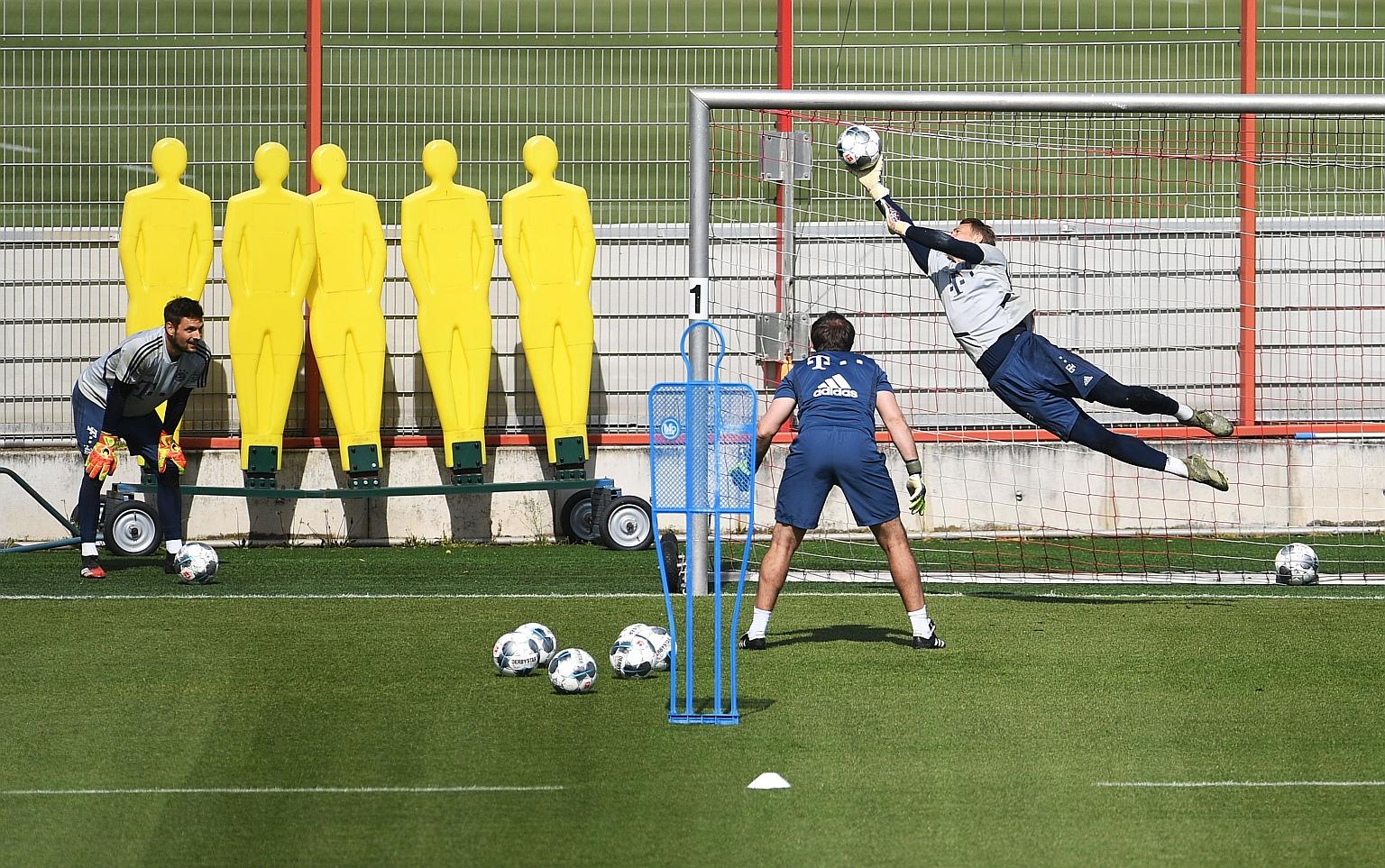 Bayern Munich goalkeepers Manuel Neuer (right) and Sven Ulreich during training last week. The German Bundesliga is set for a May 9 resumption but that date could be pushed back after Germany saw a spike in Covid-19 infections following the reopening