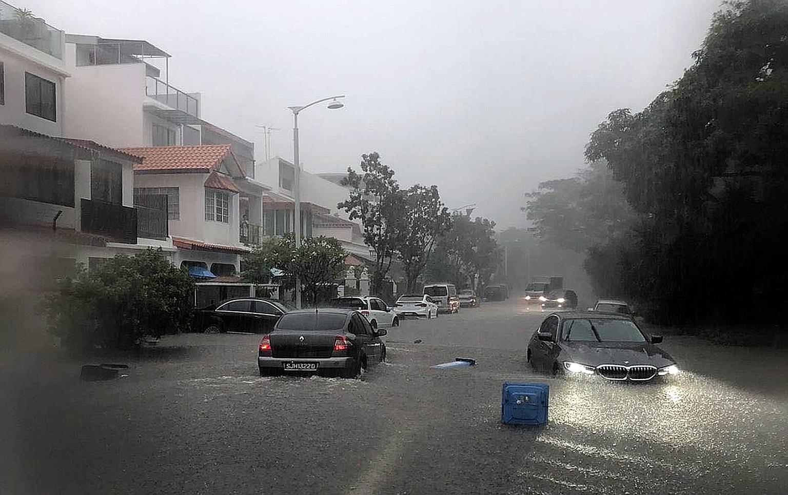 A downpour yesterday afternoon resulted in flood waters rising so much that they partially submerged the tyres of several cars in Jalan Lokam, near Kensington Square condominium in Hougang. The weather on the last day of April was much like the wet w