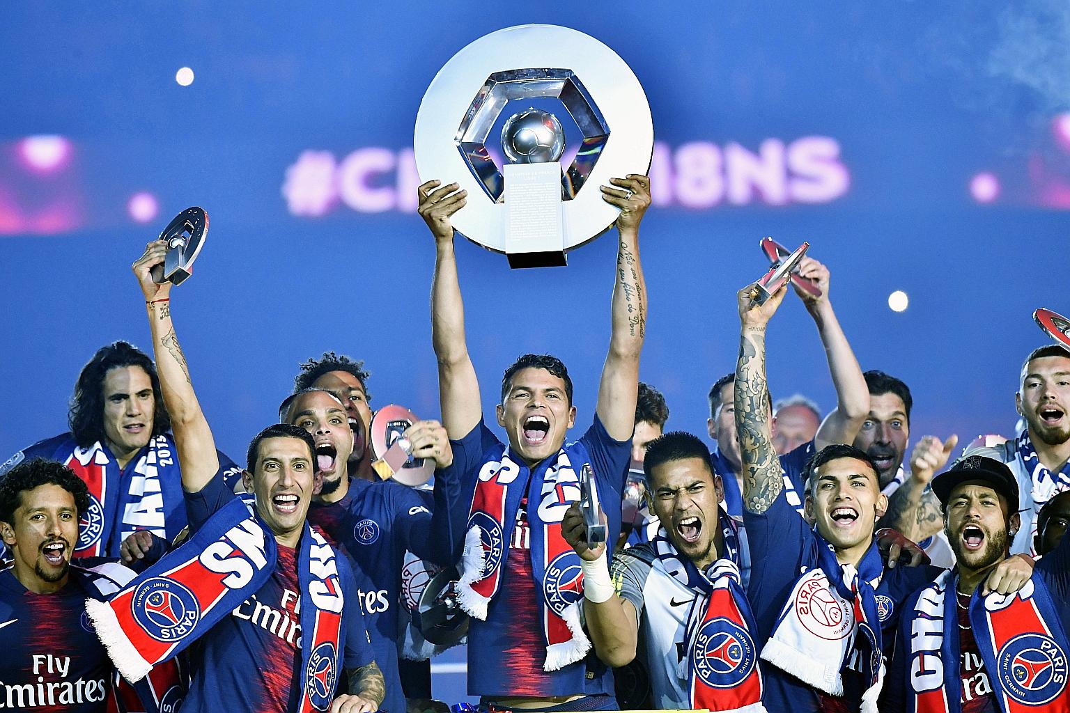 Paris Saint-Germain players celebrating with the Ligue 1 trophy last year. They have been crowned champions for the third year running, after the French League decided to end the season prematurely.