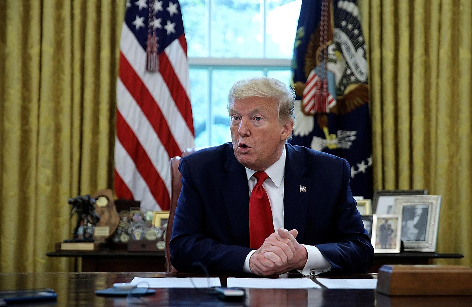US President Donald Trump says he is looking at different options in terms of consequences for Beijing over the coronavirus pandemic. PHOTO: REUTERS