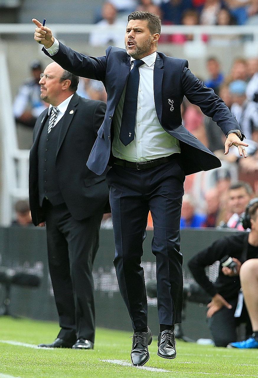 Tottenham Hotspur's then manager Mauricio Pochettino, with Newcastle's ex-manager Rafael Benitez during their match at St James' Park on Aug 11, 2018, feels motivated for his next job, but says he still feels the pull of Spurs.