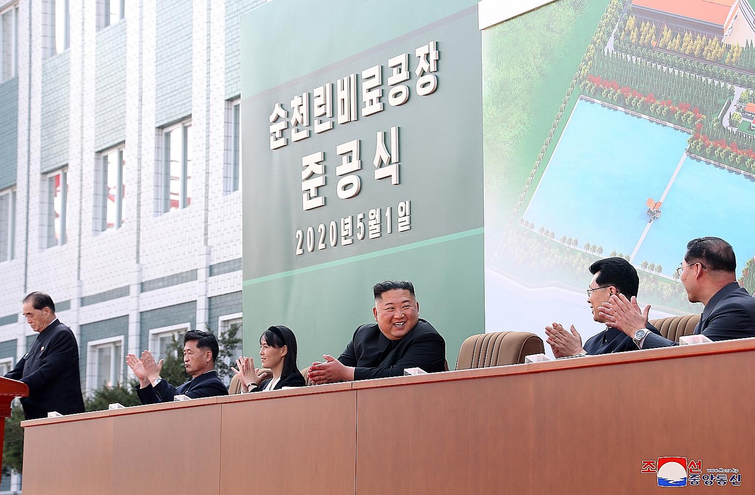 North Korean leader Kim Jong Un attending an event to mark the completion of a fertiliser plant north of Pyongyang on Friday, accompanied by his sister Kim Yo Jong and senior officials.