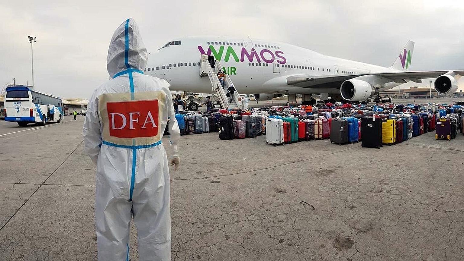 More than 800 Filipino seamen returning home last month on a special flight from the United States and Barbados. Yesterday, the Philippine government shut the country's airports to all commercial flights for at least a week, citing the need to decong