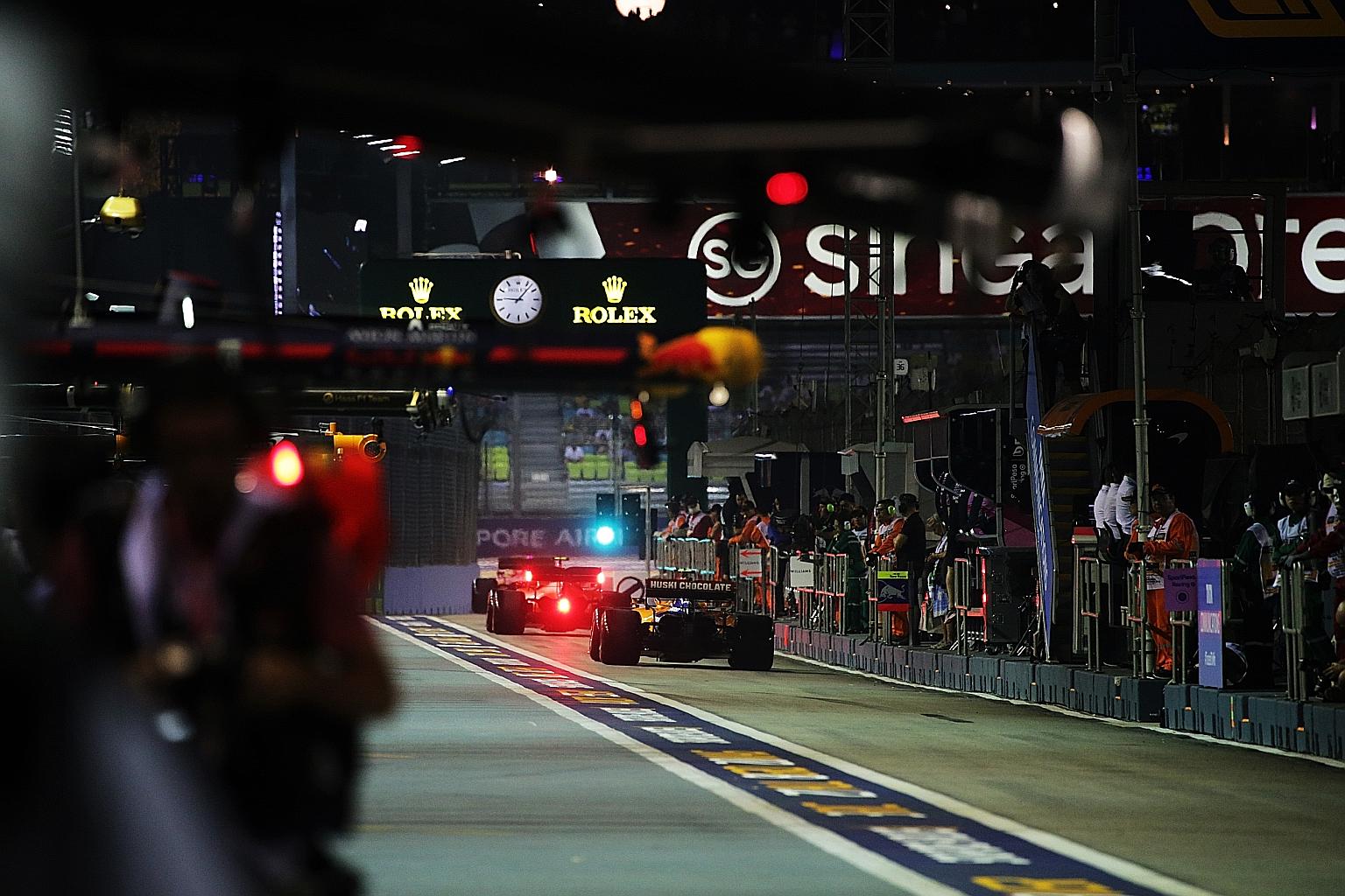Drivers leaving the pit lane during practice at last year's Singapore night race. The clock is ticking on this year's edition in September, with the F1 season yet to start amid the disruption caused by the coronavirus pandemic. ST PHOTO: KELVIN CHNG