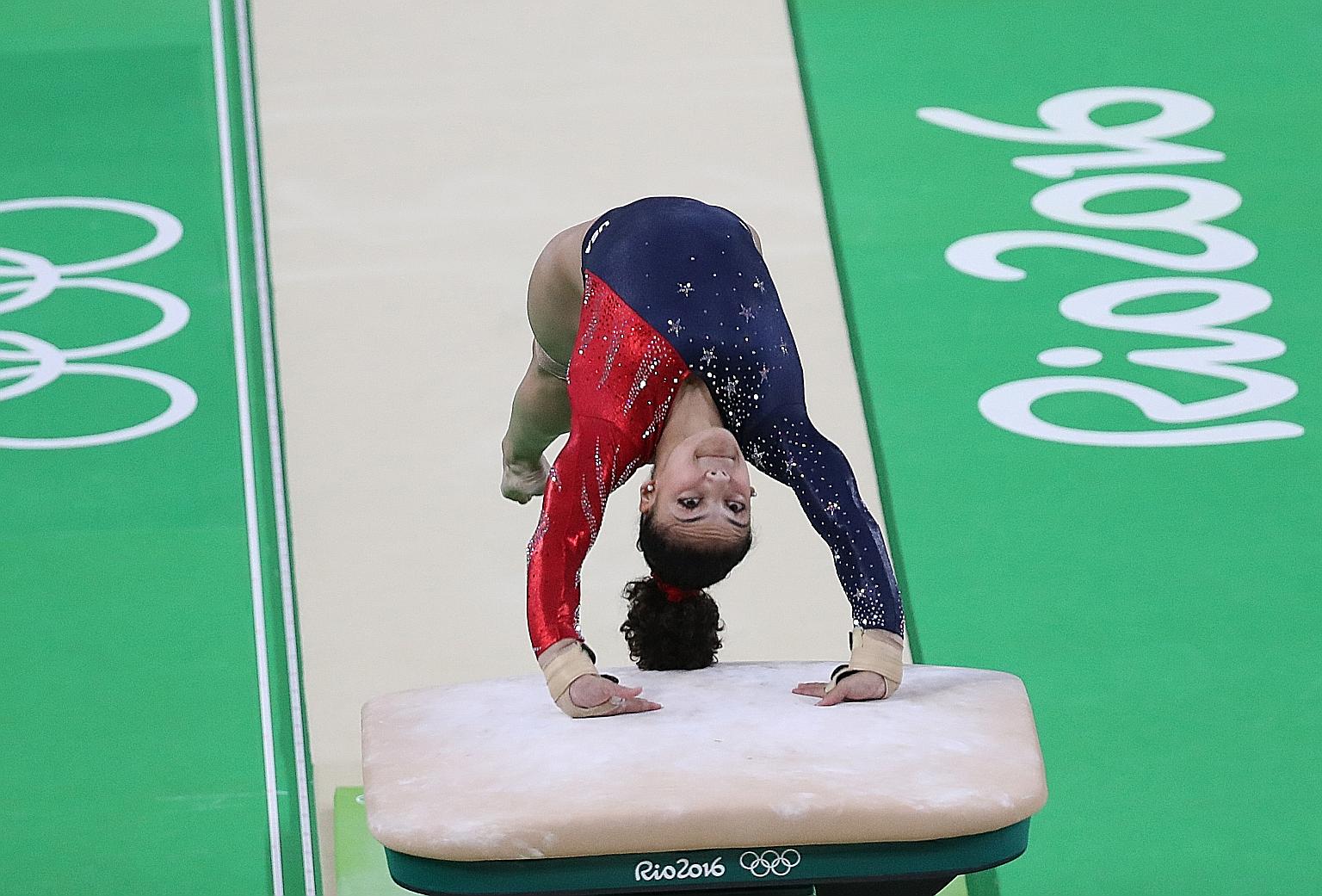 Laurie Hernandez competing at the 2016 Rio Games. Weeks after winning a gold and a silver at the Olympics, she told her mother about the abuse she was suffering. PHOTO: EPA-EFE