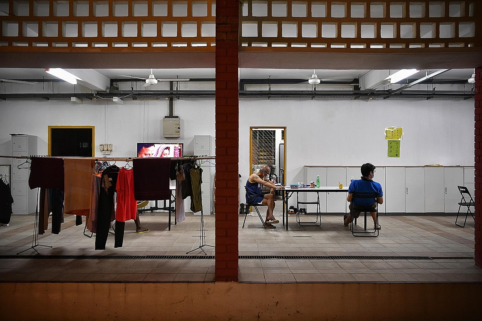 Residents at Transit Point @ Margaret Drive, a transitional shelter run by New Hope Community Services, last month. Minister for Social and Family Development Desmond Lee says his ministry will continue to make sure such shelters can provide space fo