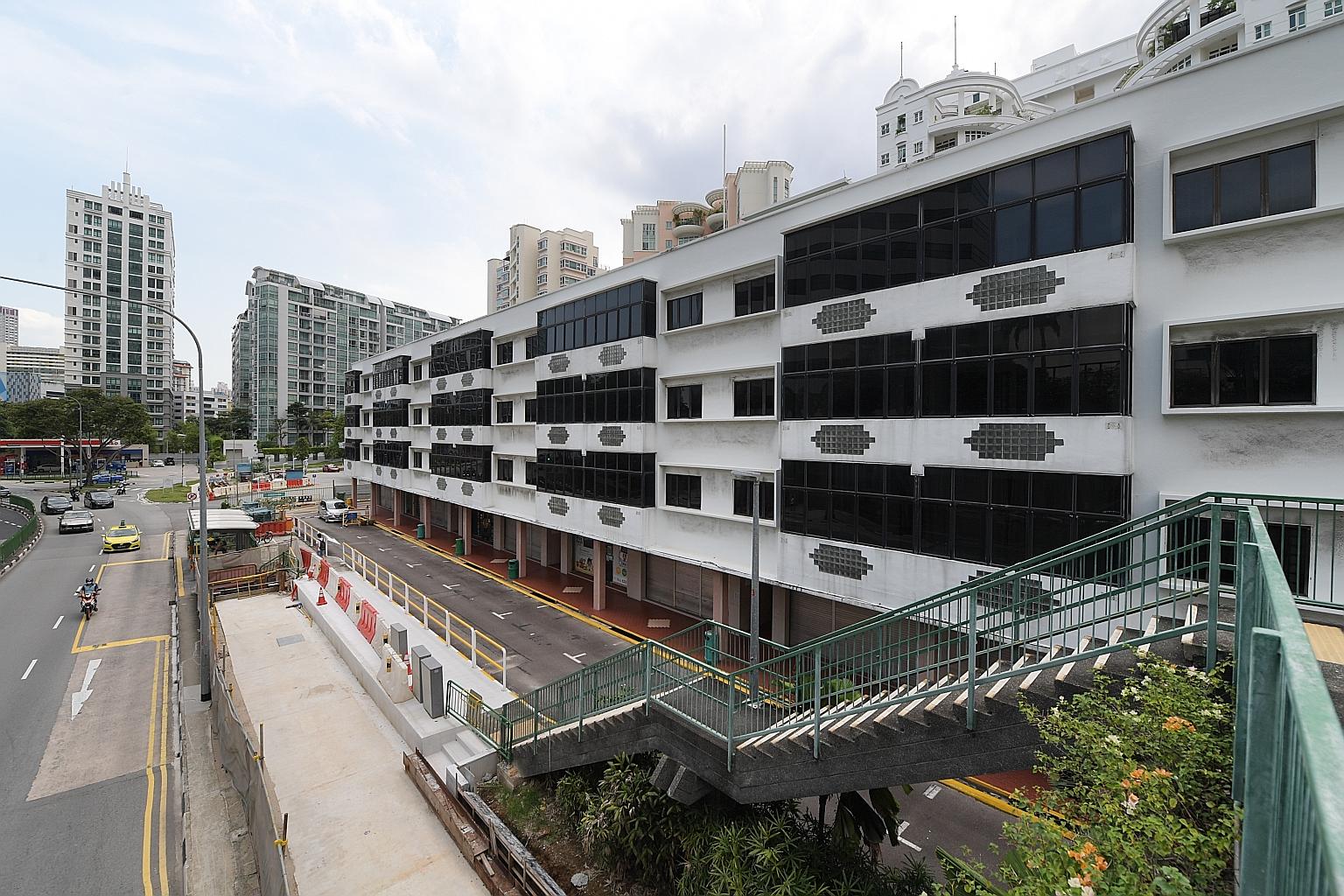 All four sisters inherited shares in four companies set up by their father. Three of the companies held properties, including 56 units in a mixed commercial and residential development in River Valley Road (above).