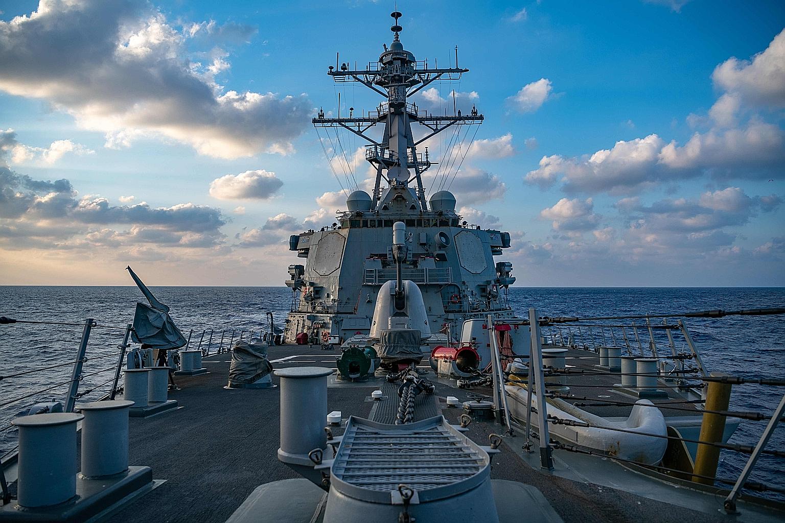 A photo released by the United States Navy of the Arleigh Burke-class guided-missile destroyer USS Barry (DDG-52) conducting underway operations in the South China Sea on April 28.