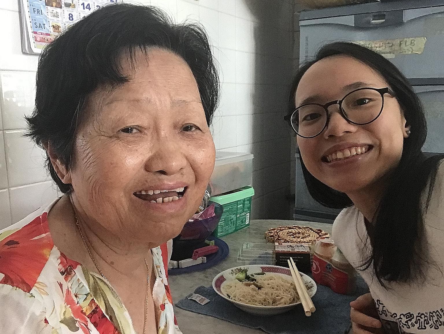 The writer, 19, and her grandmother having lunch in the latter's kitchen.