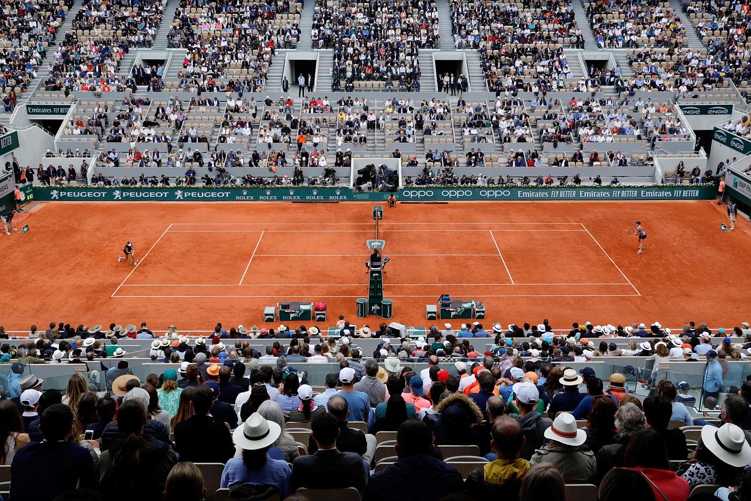 Czech Marketa Vondrousova (left) and Australia's Ashleigh Barty competing in the French Open final last May. This year's tournament is set to conclude on Oct 4.