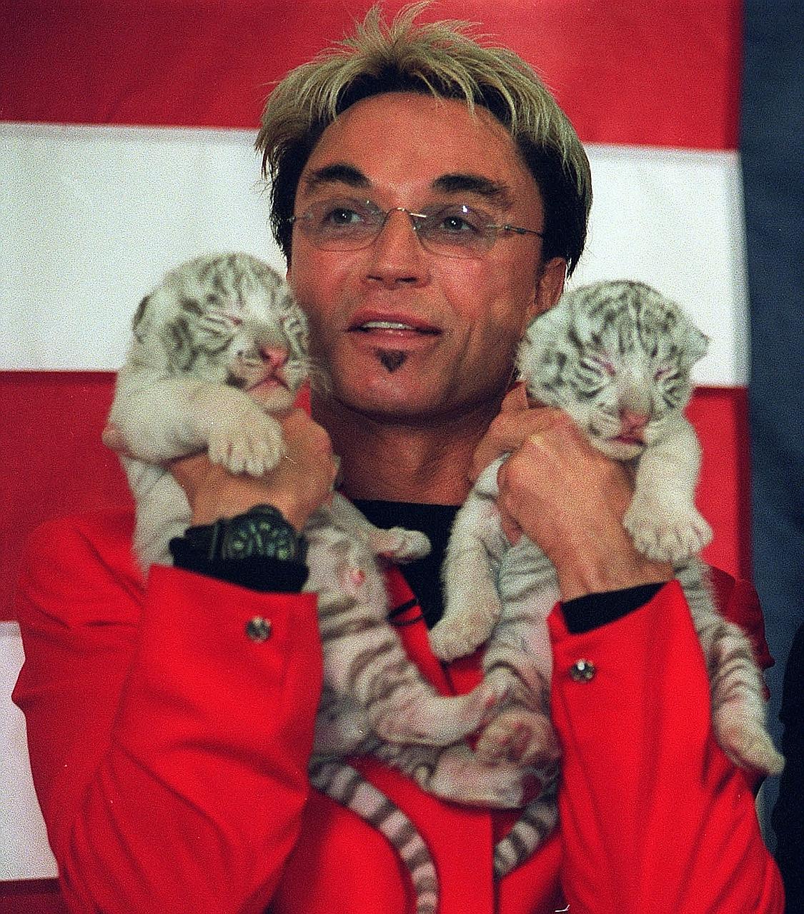 Roy Horn (with tiger cubs at The Mirage, Las Vegas, in 2002), half of illusionist duo Siegfried and Roy, died last Friday of complications from the coronavirus.