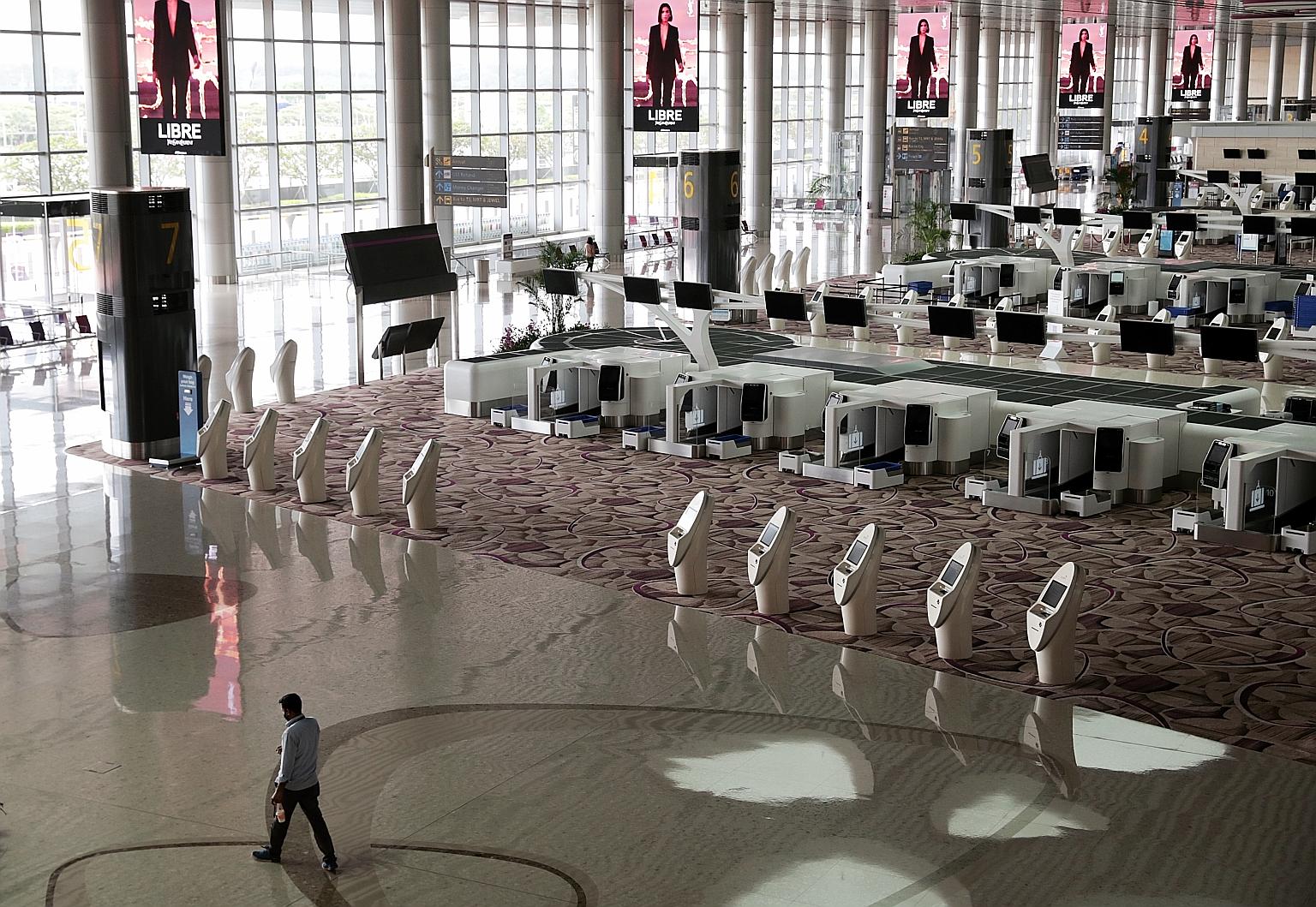 The suspension of operations at Changi Airport Terminal 4 (above) follows the same at Terminal 2 on May 1. Changi Airport Group said yesterday that "terminal operations will be consolidated further to optimise resources in tandem with the sharp decli