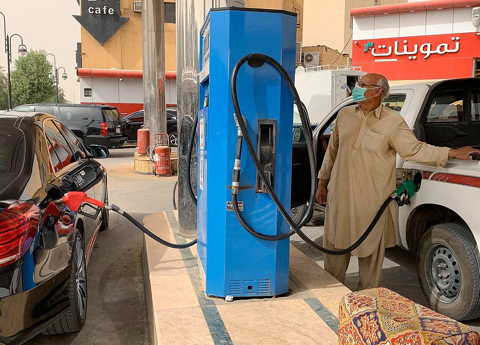 A petrol station in the Saudi capital Riyadh. Saudi Arabia on Monday said it would add to existing oil output cuts by a further one million barrels per day (bpd) next month, slashing total production to 7.5 million bpd, or down nearly 40 per cent fro