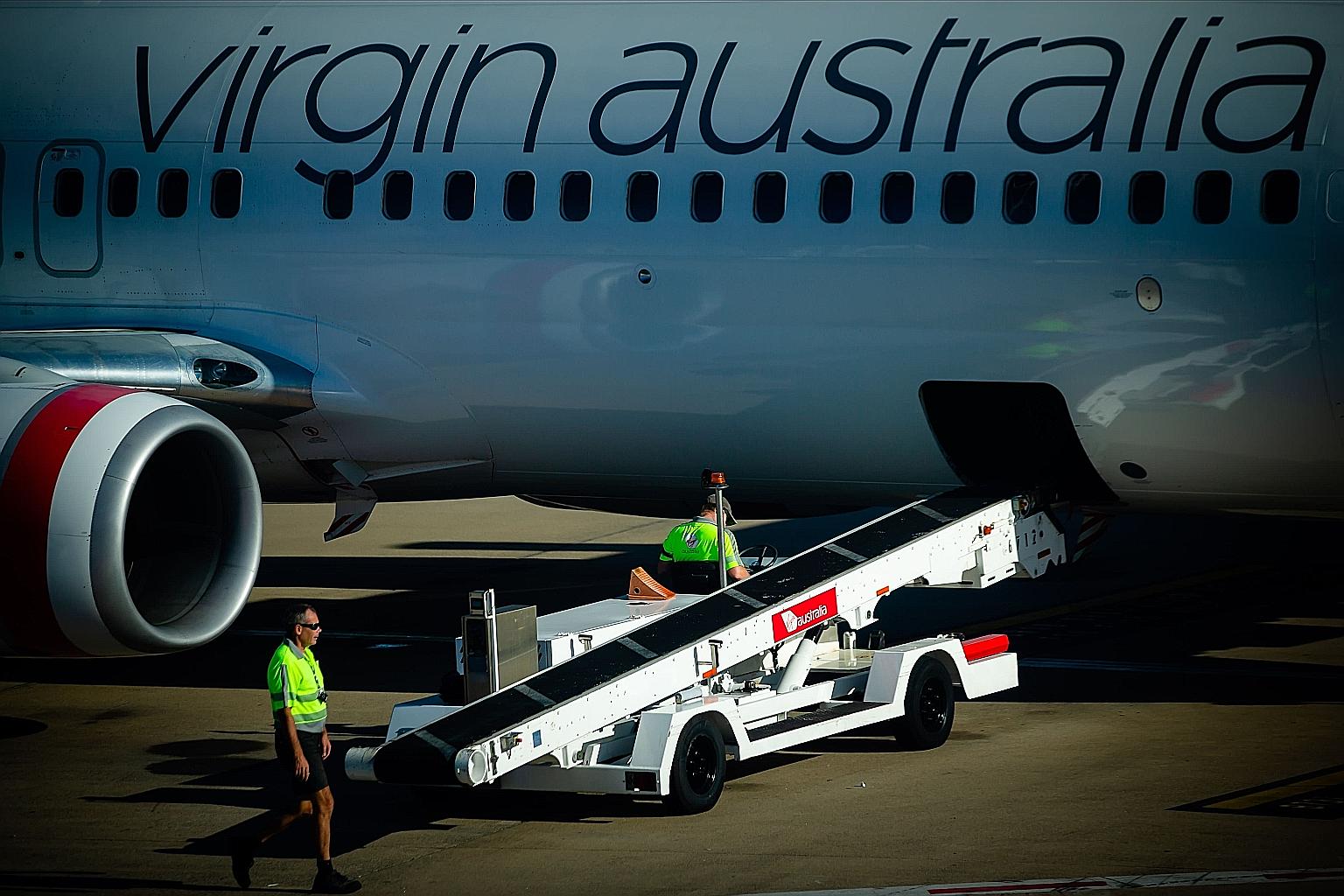 Virgin Australia has 117 leased planes and engines, of which only 50 are operational due to the low demand brought on by the pandemic. The airline reported seven consecutive annual losses before it folded. PHOTO: AGENCE FRANCE-PRESSE