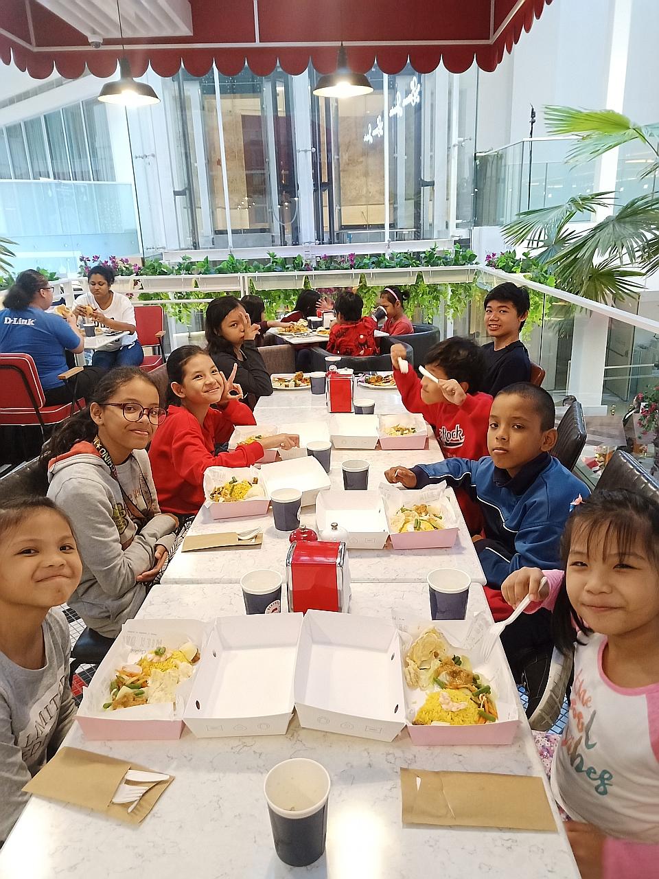 The Straits Times School Pocket Money Fund beneficiaries at a charity night in celebration of Perennial Real Estate Holdings' 10th anniversary and The Capitol Kempinski Hotel's first anniversary on Dec 6 last year. About 10,000 students from low-inco