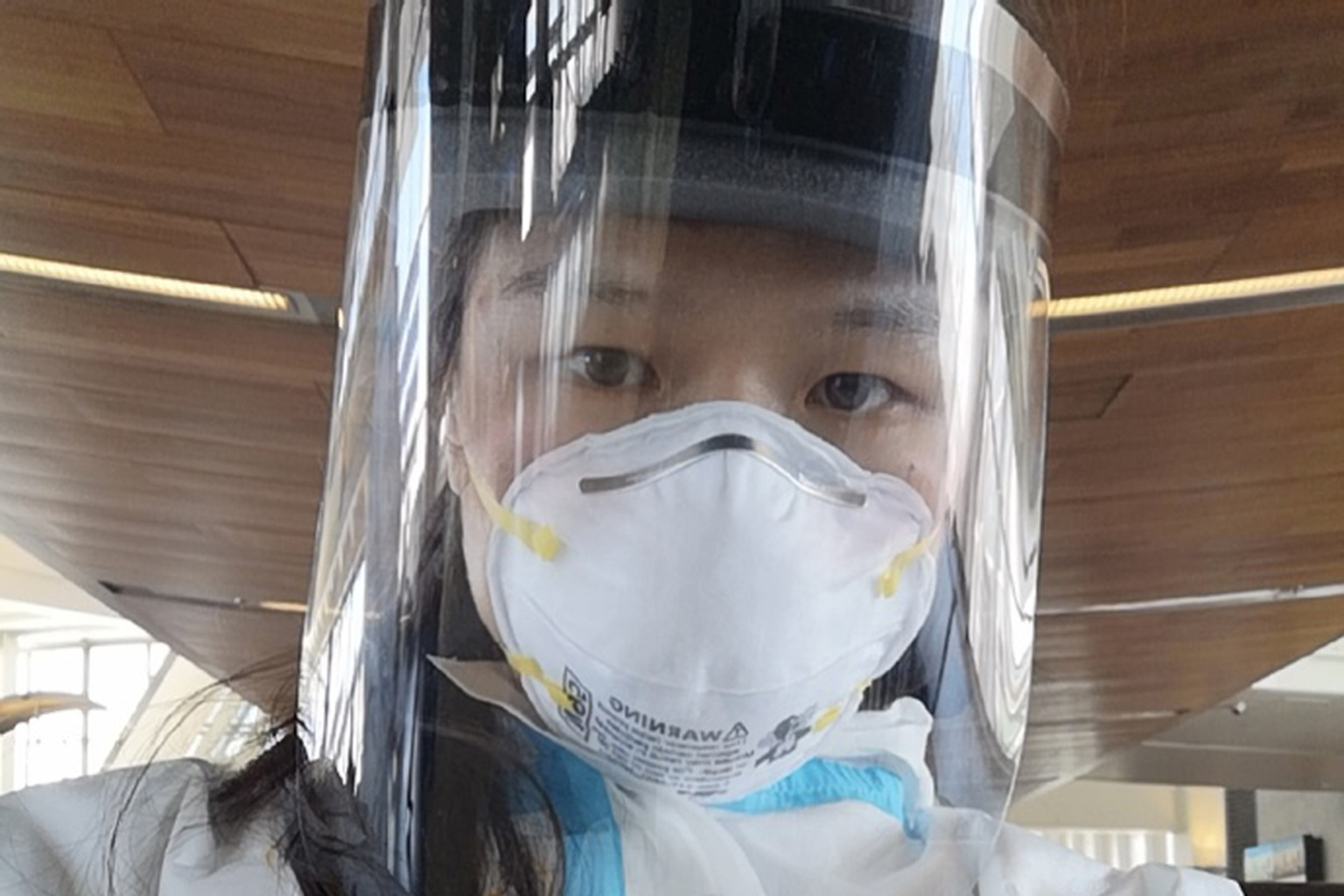 Even though Zhang Weili wore a disposable protective suit, face shield and N95 mask as she made her way back to China after a successful UFC strawweight title defence in March, fans still recognised her.