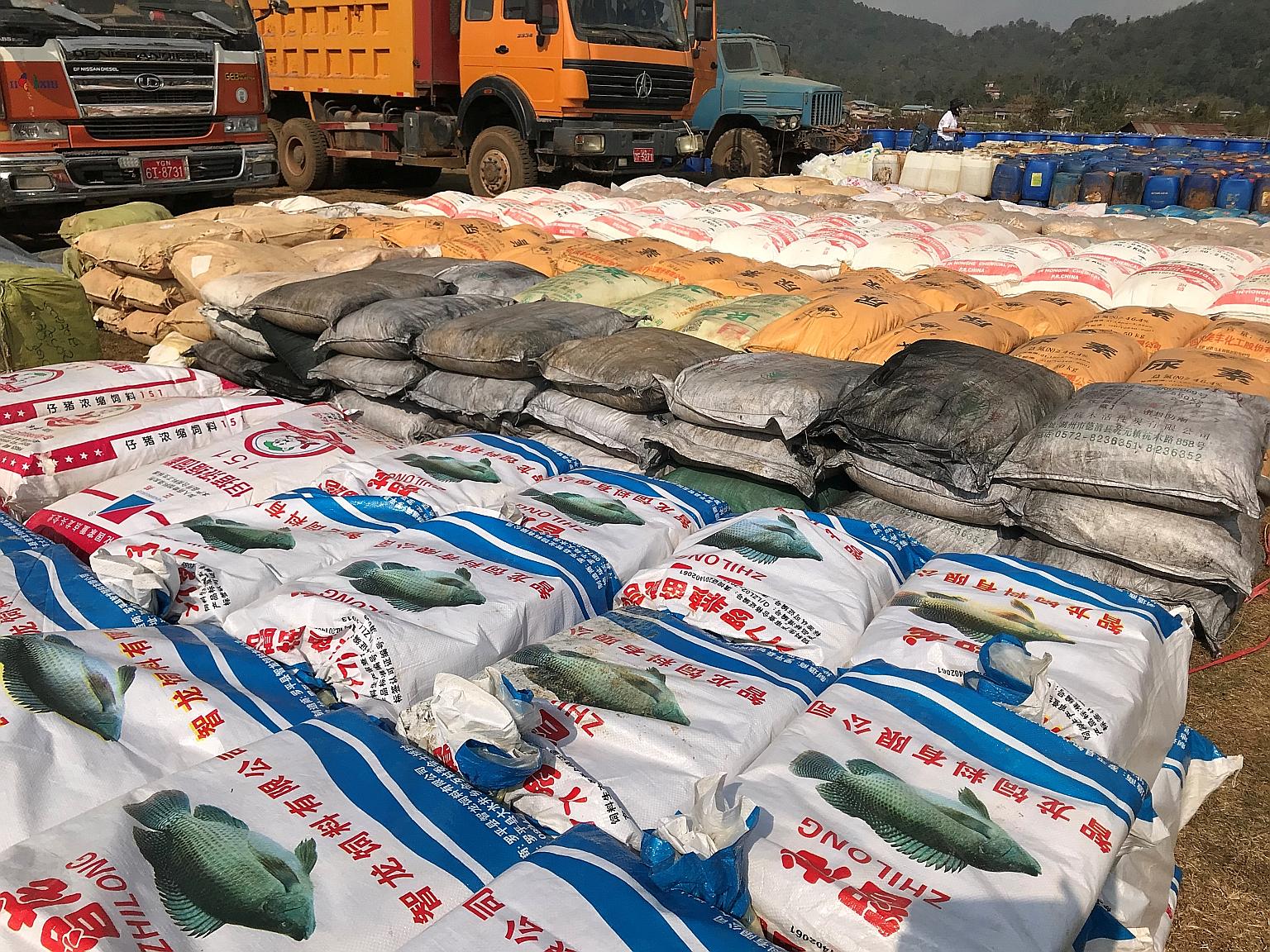 Precursor chemicals used to make illicit drugs seized by Myanmar's police and the military near Loikan village in Shan state.