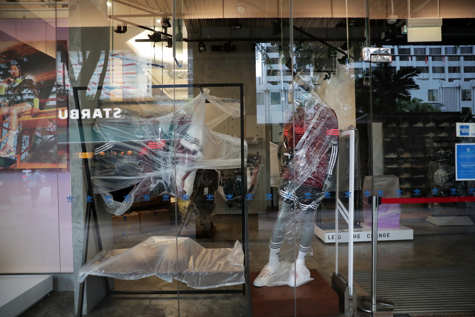 A closed store in Orchard Road. The extended closure of already hard-hit sectors such as retail, F&B, hospitality and recreation could inflict more damage, said senior economist Chua Hak Bin of Maybank Kim Eng.