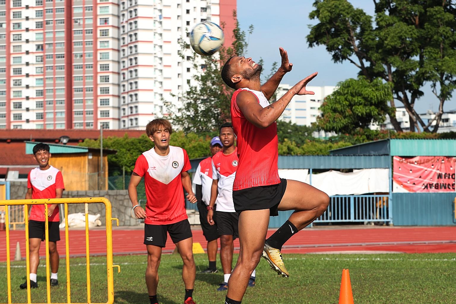 Tanjong Pagar's Luiz Junior heading the ball during pre-season training in February. The FAS last month disbursed an additional subsidy of over $600,000 for local clubs to pay their players' full wages during the SPL hiatus. 