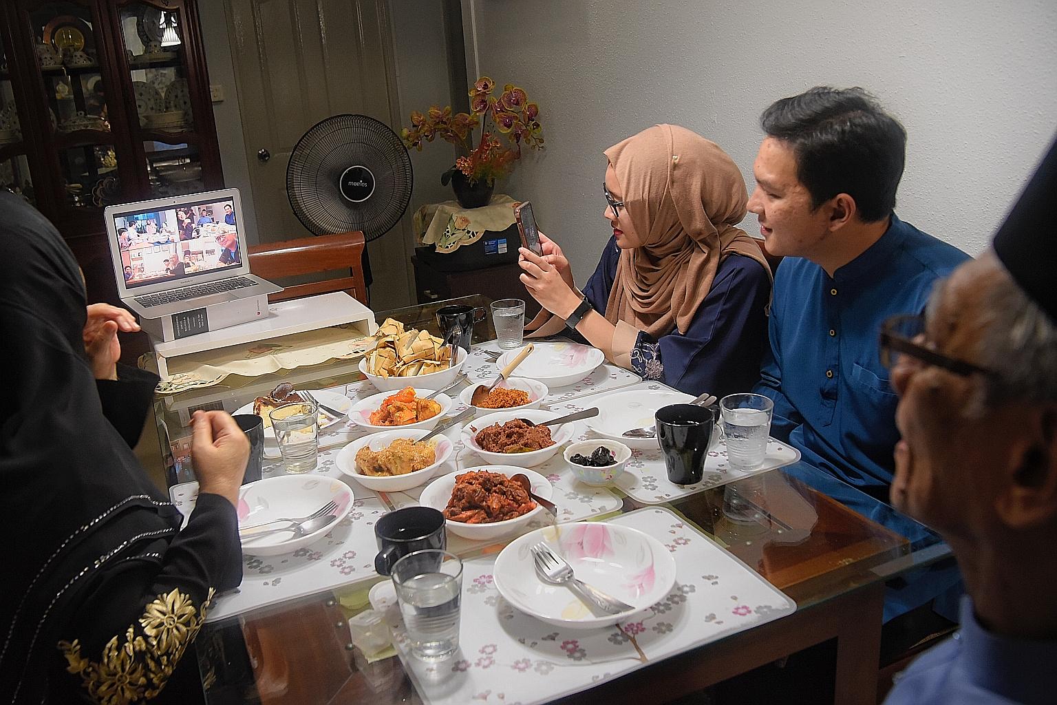 Mr Saparin Rasikin, his wife Rahima Daiman, their daughter Nur Amalina Saparin and her husband Muhammad Faris Abdul Malik videochatting with the older couple's other children and their families yesterday.