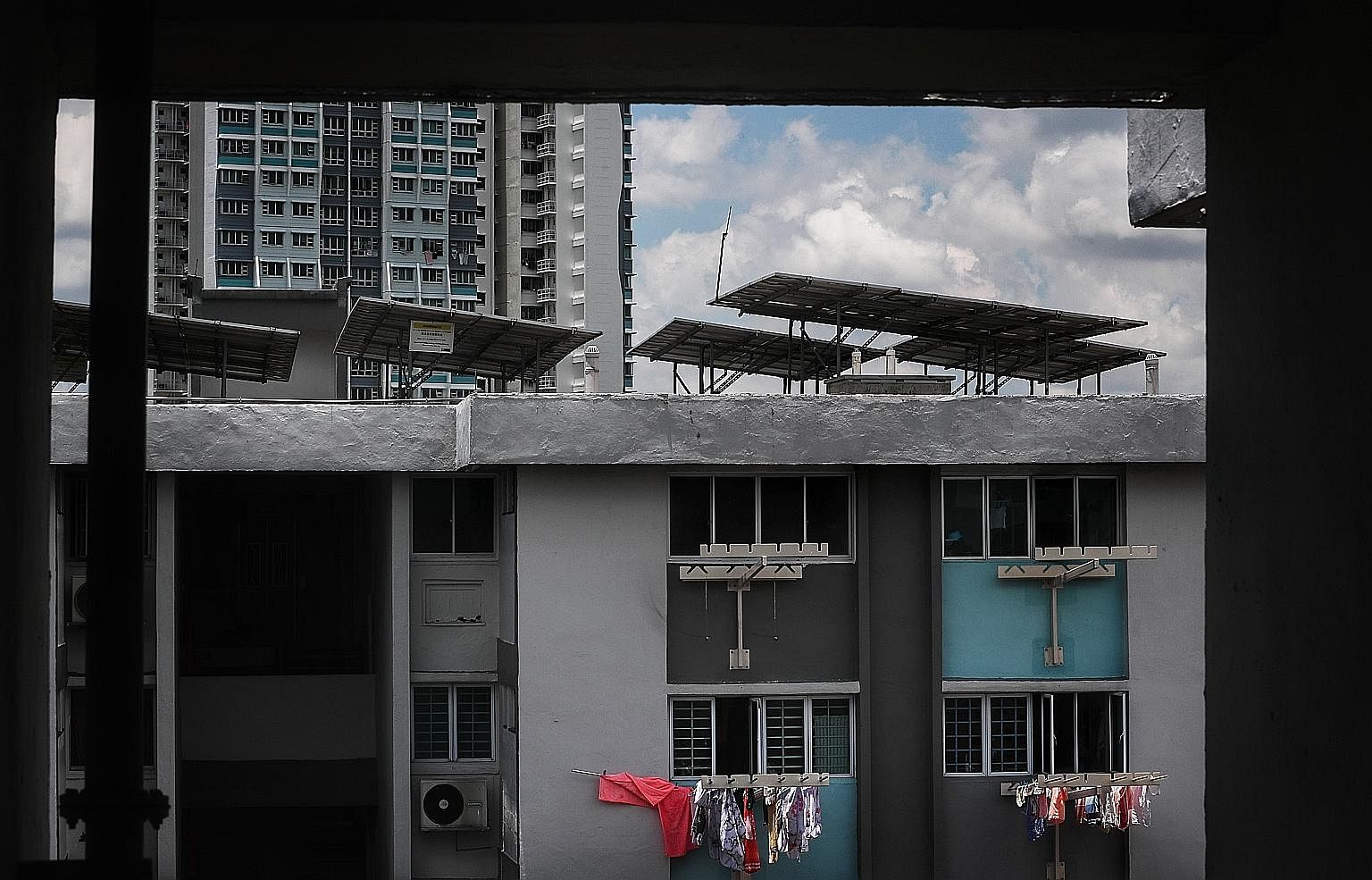Solar panels on the rooftops of Housing Board blocks in Ang Mo Kio. The Government's green vision includes dramatically increasing solar energy generation and electric vehicle use, reducing household waste, making buildings much more energy-efficient