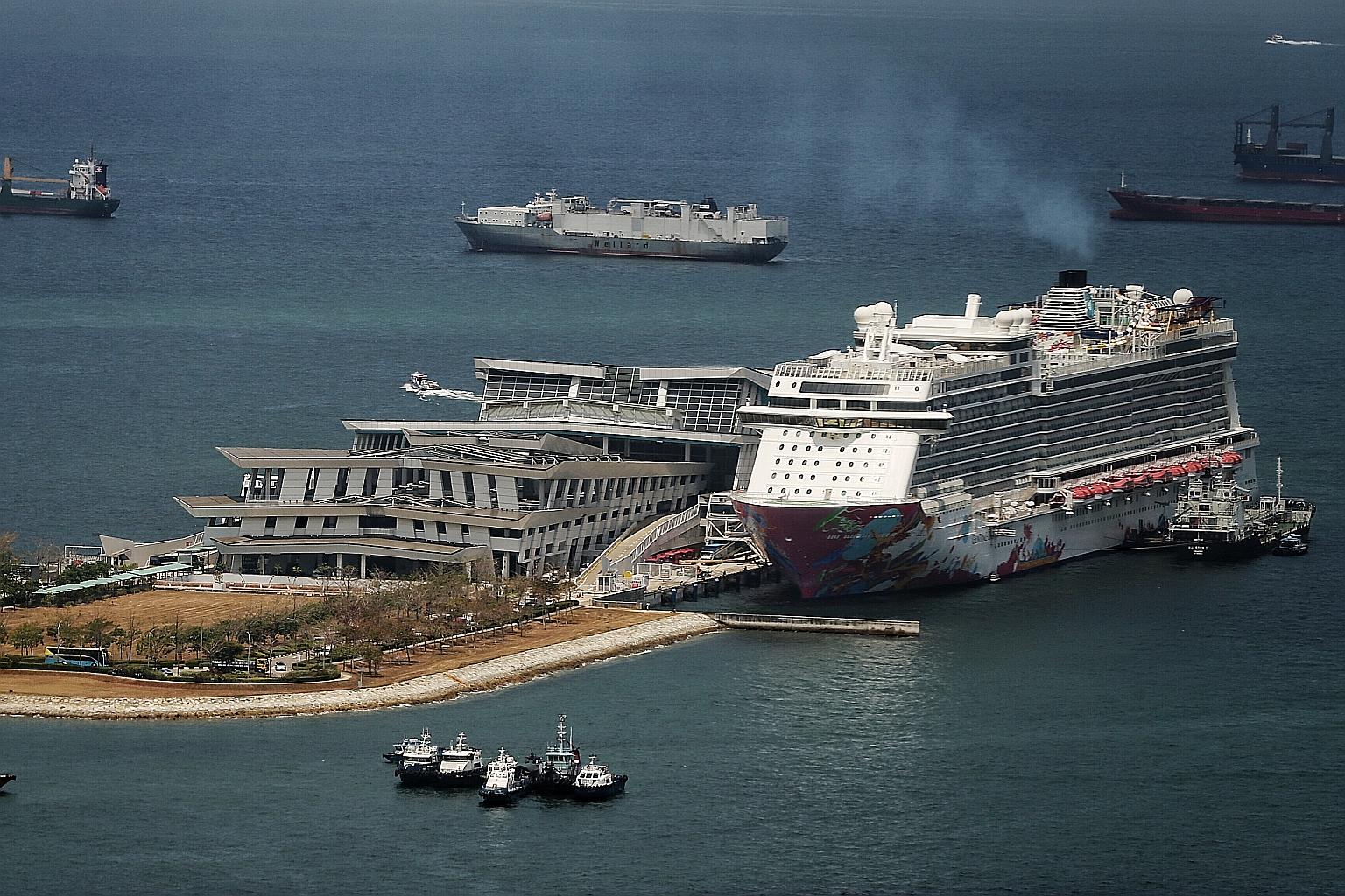 A ship docked at the Marina Bay Cruise Centre last year. Genting Cruise Lines, which operates the Star, Dream and Crystal Cruises brands, says operations are anticipated to resume in July or August, depending on factors such as ports reopening and tr