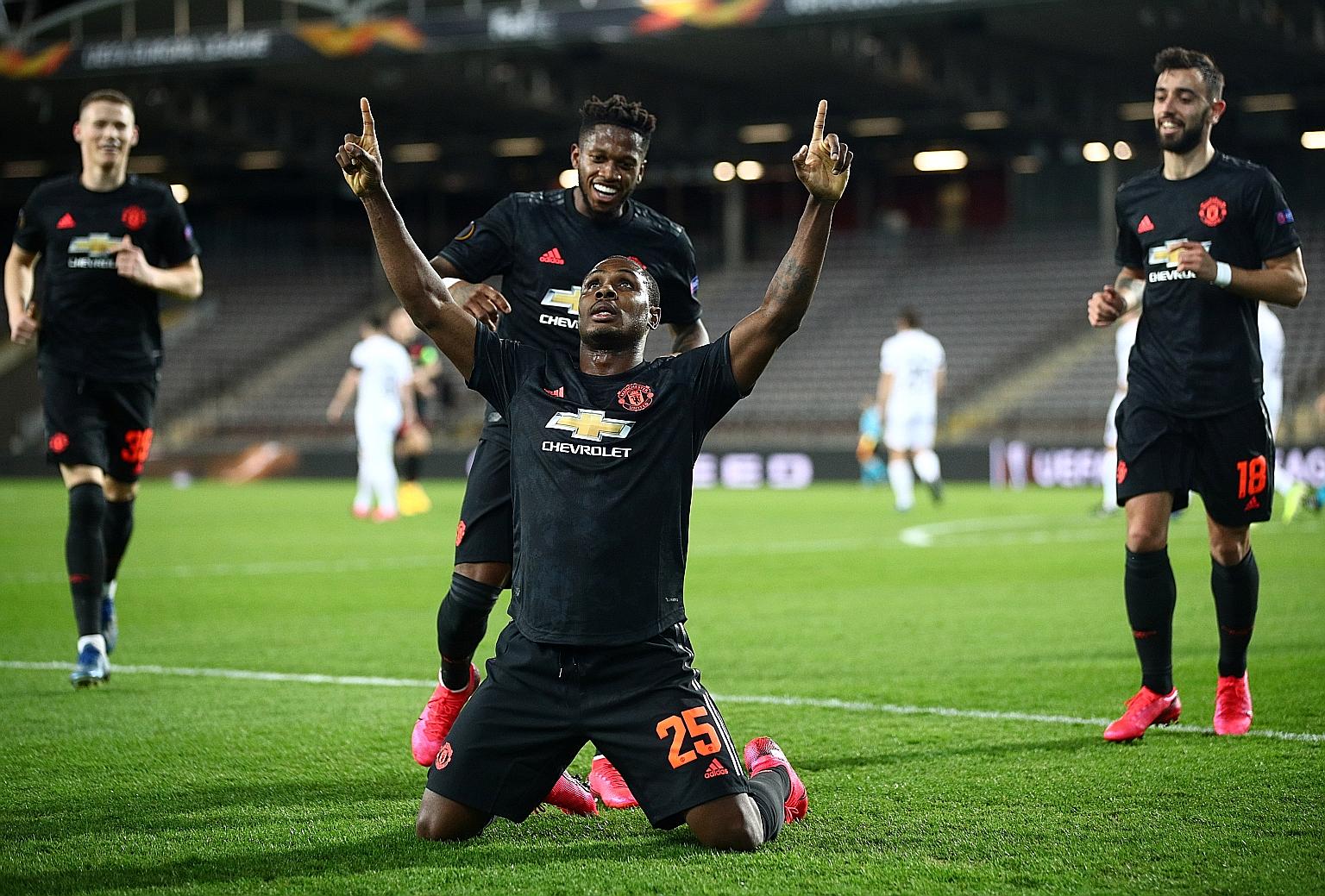Brazilian Fred joins in the celebrations after Nigerian Odion Ighalo opens accounts for United in their 5-0 win in the first leg of their Europa League last-16 tie against Austria's Lask on March 12. It was United's last game before the coronavirus c