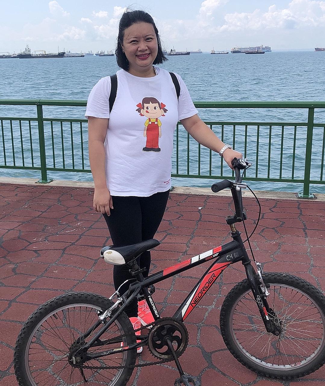 Before she was diagnosed with schizophrenia in 2007, Ms Valerie Liu heard voices in her head. Today, she rarely hears them, thanks to the right medication, and counselling and support from health professionals and her mother. PHOTO: COURTESY OF VALER