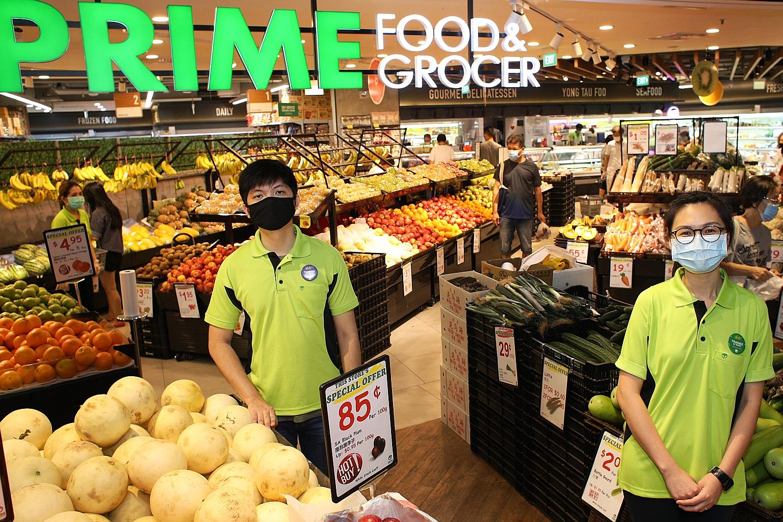 (From left) Retail assistants Niki Lim and Wendy Leong are working at Prime Food & Grocer supermarket in Century Square mall. Ms Leong, an air stewardess who was placed on furlough, applied through the virtual career fairs platform under Workforce Si