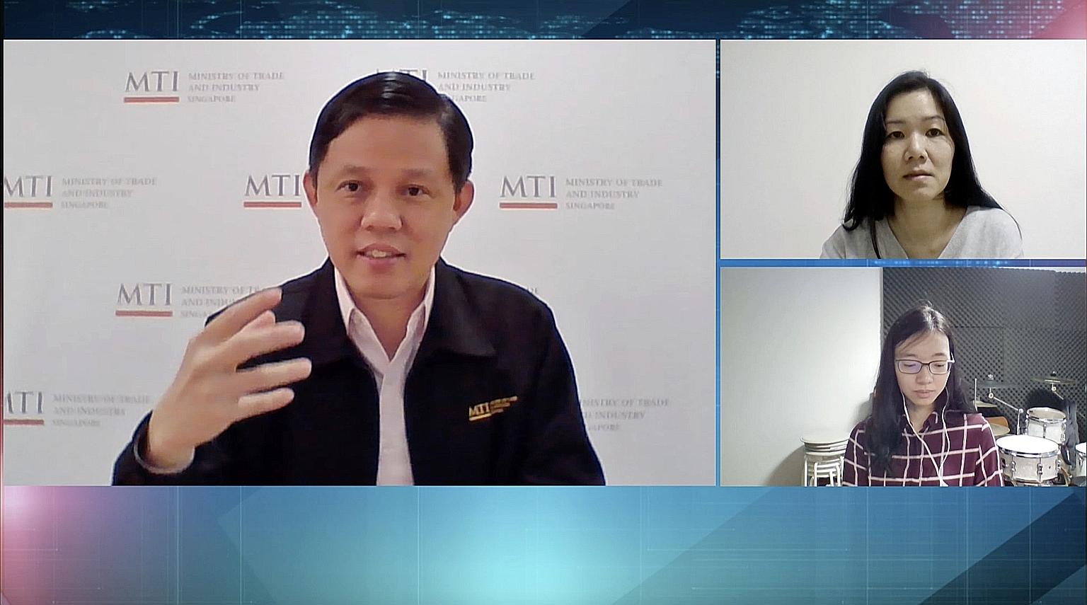 Trade and Industry Minister Chan Chun Sing speaking to The Straits Times' senior political correspondent Tham Yuen-C (top right) and manpower correspondent Joanna Seow in a video interview on Wednesday. PHOTO: SPH