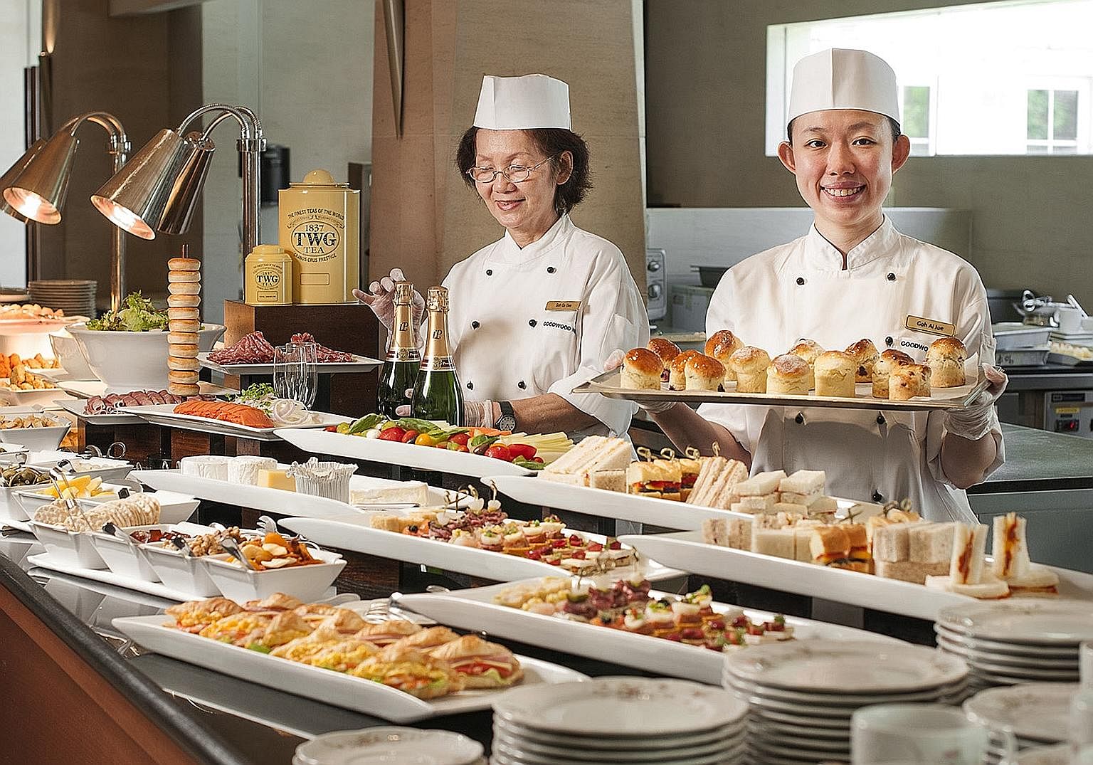 At Goodwood Park Hotel buffets, staff are stationed at the counters to serve dishes, to reduce diners' contact with food. 