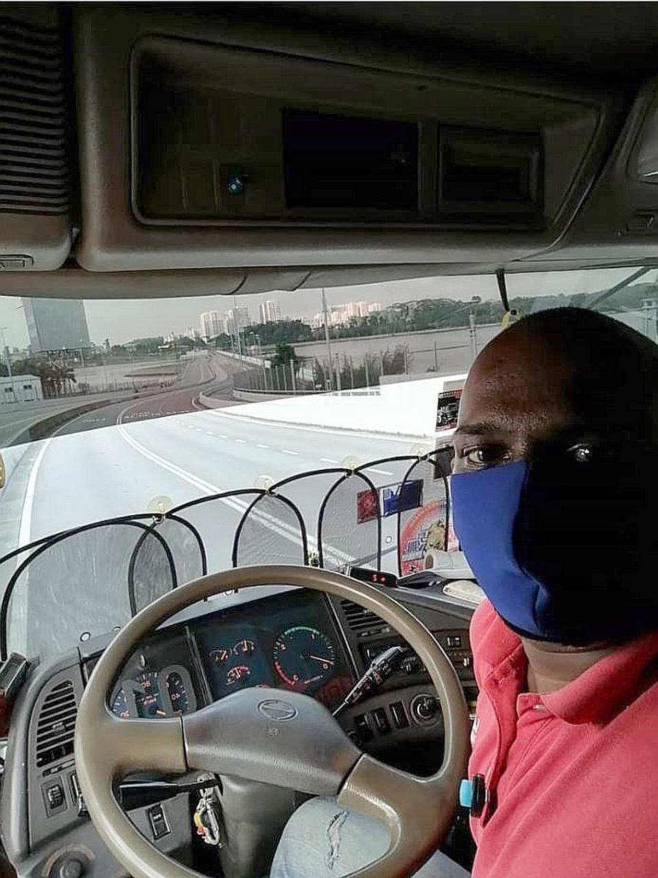 Travel curbs in both Singapore and Malaysia have seen traffic at the Woodlands and Tuas checkpoints empty out. These days, Malaysian lorry driver Muhammad Rizwan Muhammad is able to make faster journeys from Johor Baru to Singapore and back. PHOTO: C