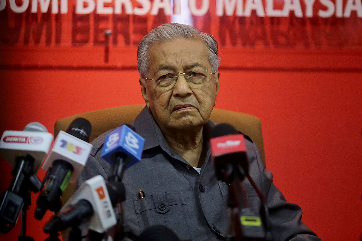 Dr Mahathir Mohamad (left) is trying to deprive incumbent Prime Minister Muhyiddin Yassin of a simple majority in Parliament, while Mr Muhyiddin needs to increase the number of his MPs to stabilise his administration. PHOTOS: BERNAMA
