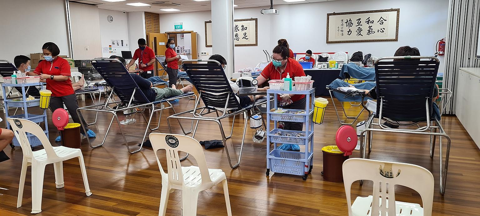 Donors at a community blood drive at the Tzu Chi Foundation last month. Currently, only four mobile drives are held each week compared with at least 10 such drives weekly in the past. PHOTO: SINGAPORE RED CROSS