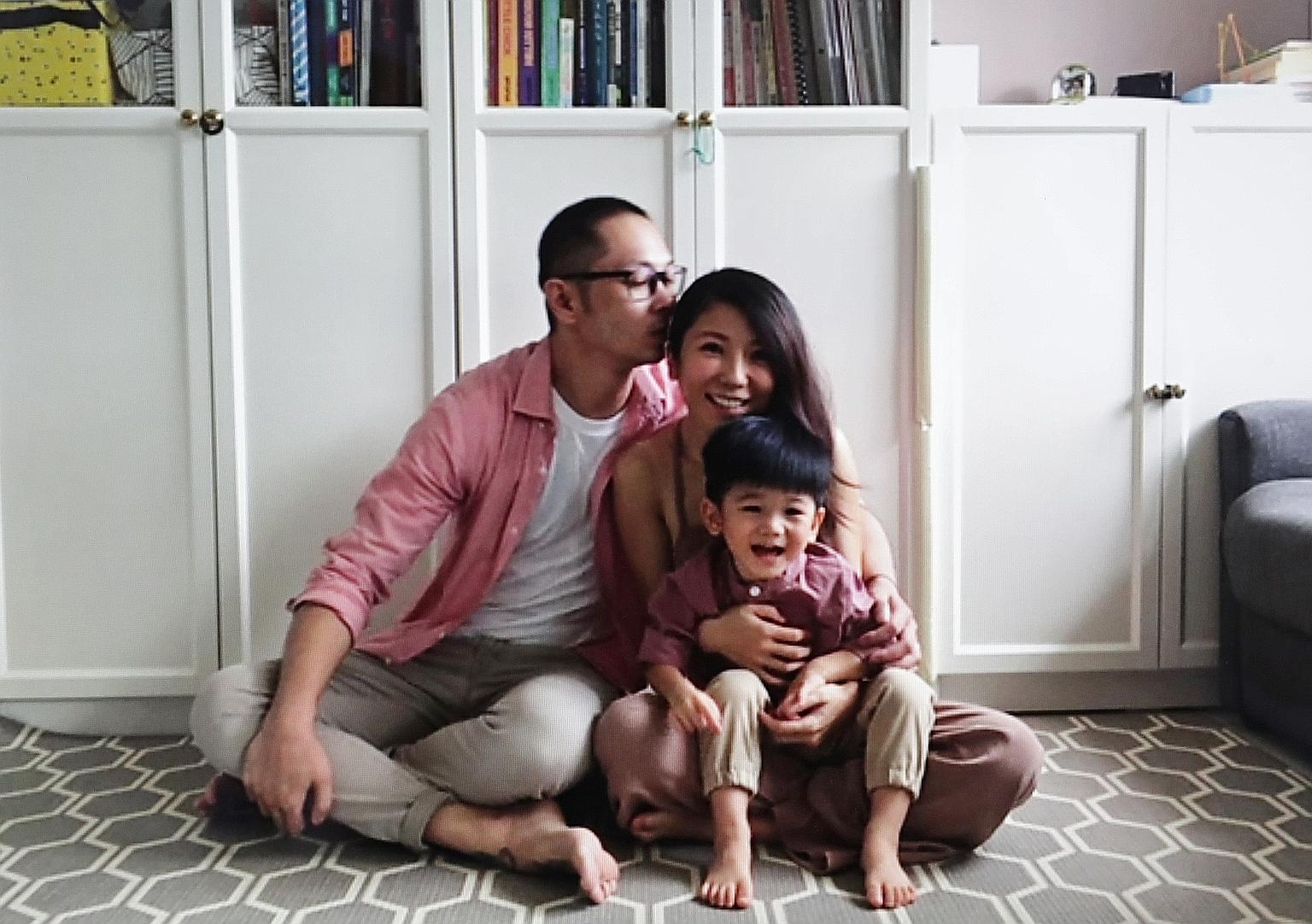 Commercial photographer and film director Nicky Loh and his wife Vivi, with their two-year-old son Nathan. This photograph was shot during a Zoom call. ST PHOTO: NEO XIAOBIN