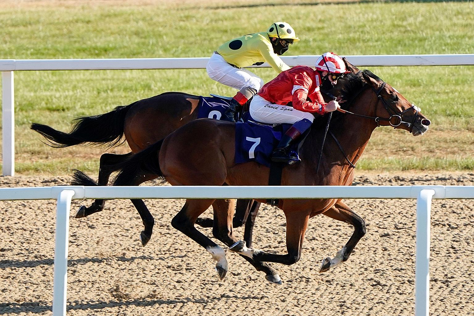 David Egan riding Valyrian Steel to win the Betway Maiden Stakes (Div II) at Newcastle Racecourse on Monday, as English racing resumed without fans present. Other health and safety precautions undertaken included the wearing of masks by jockeys and s