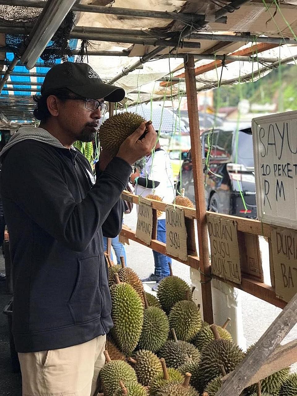 A box of branded durians, such as Musang King and D24, that usually costs RM35 (S$11.50) is now being sold for as low as 66 sen as part of one online site's super sales promotion that ends this Saturday.