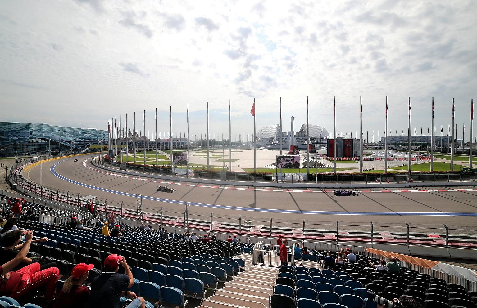 Fans watching a practice session ahead of the Russian Grand Prix last year. The Sochi circuit is near an airport and living quarters that was once part of the Olympic Village.